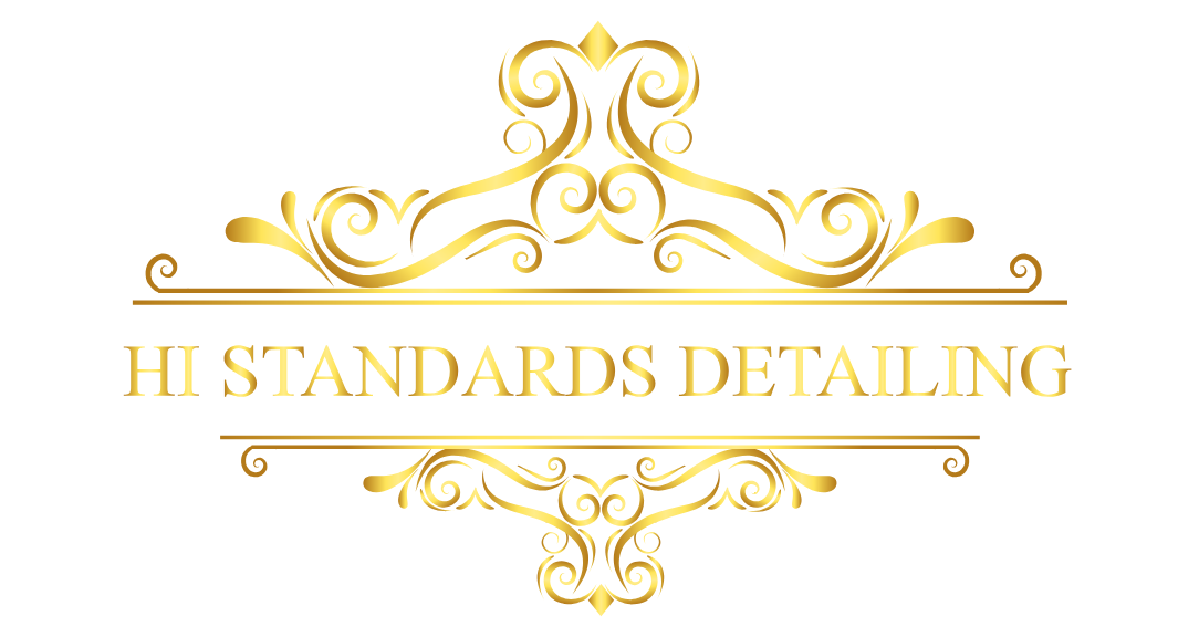 Golden ornate logo for Hi Standards Detailing with decorative flourishes